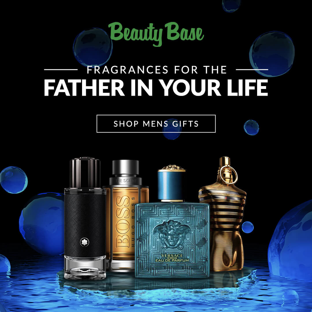 Four men's fragrances lined up with a black background and dark blue bubbles surrounding them